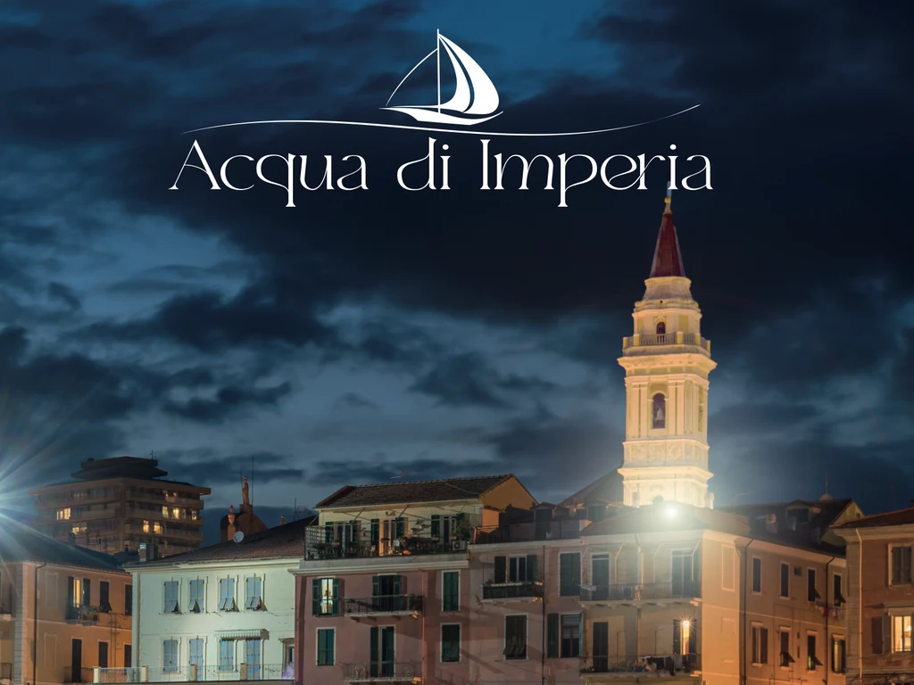 Logo Acqua di Imperia sul porto di Oneglia di notte Logo Acqua di Imperia sul porto di Oneglia di notte